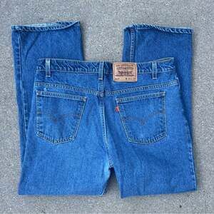 Vintage 90s Levi’s 517 orange tab boot cut jeans 38x30